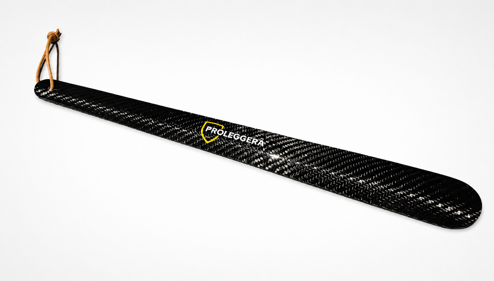 Large luxury carbon shoehorn by PROLEGGERA, featuring a twill-weave carbon design.