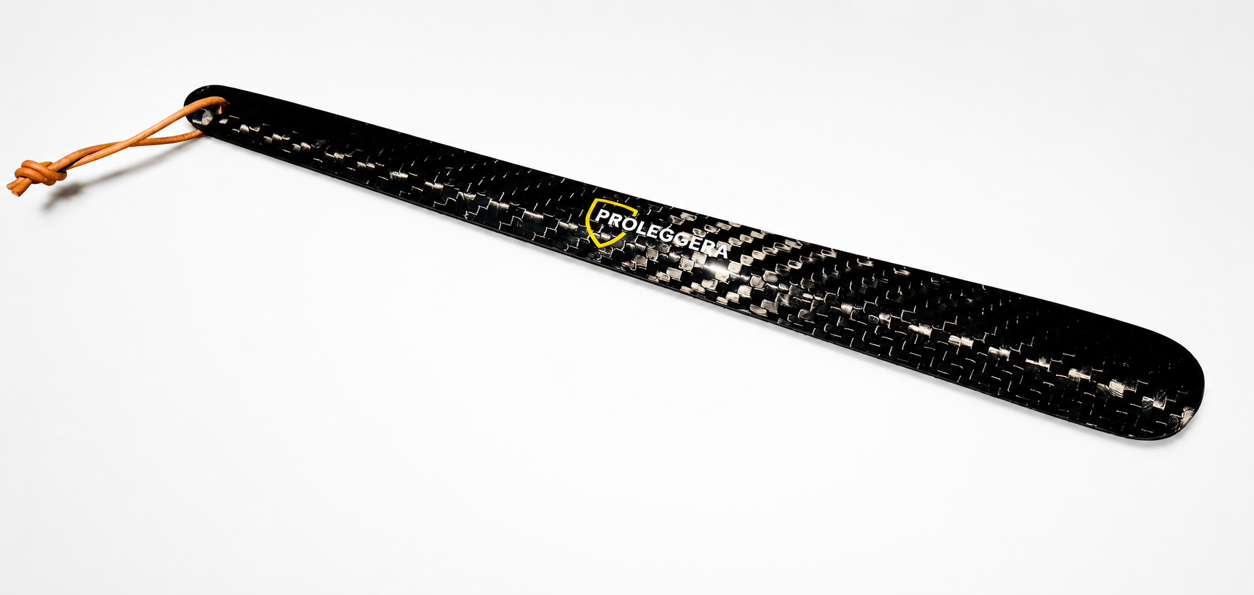 Large luxury carbon shoehorn by PROLEGGERA, featuring a coarse twill-weave carbon design.